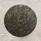 Mansa Tea | Amber Pu'er | Bangwei Ancient Tree Raw Pu'er | high quality aged pu'er or pu-erh tea, a type of post-fermented tea from Yunnan province, with aging potential of 40-60 years - image of aged pu'er or pu-erhtea cake