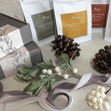 Mansa Handcrafted Aged Tea | Pouch packaging of 2oz of aged teas, including pu-erh, aged white tea, and dark brick tea