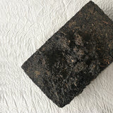 Mansa Tea | Onyx Black | Anhua Golden Flower Brick - high quality aged dark tea, a type of post-fermented tea from Hunan province, with aging potential of 40-60 years - image of dark tea brick