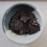 Loose tea cake of Ripe Pu-erh