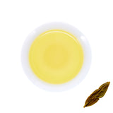 Volcanic Yellow Tea - Brewed Tea and Wet Leaves