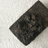 Mansa Tea | Onyx Black | Anhua Golden Flower Brick - high quality aged dark tea, a type of post-fermented tea from Hunan province, with aging potential of 40-60 years - image of dark tea brick
